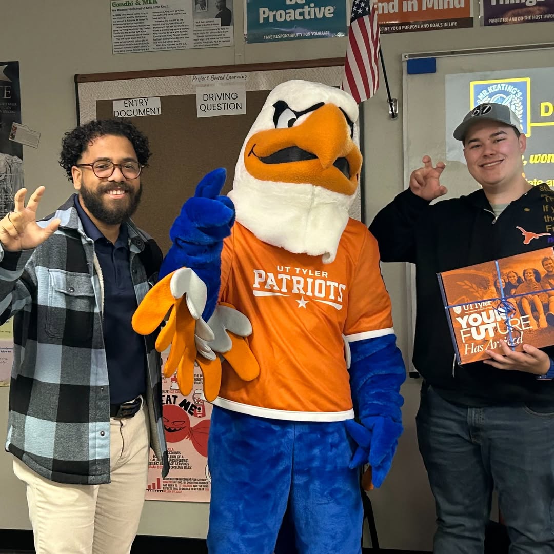 student with Swoop mascot